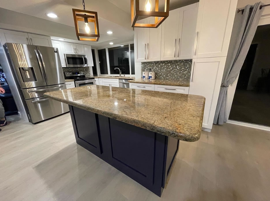 Kitchen cabinets painted white after refinishing