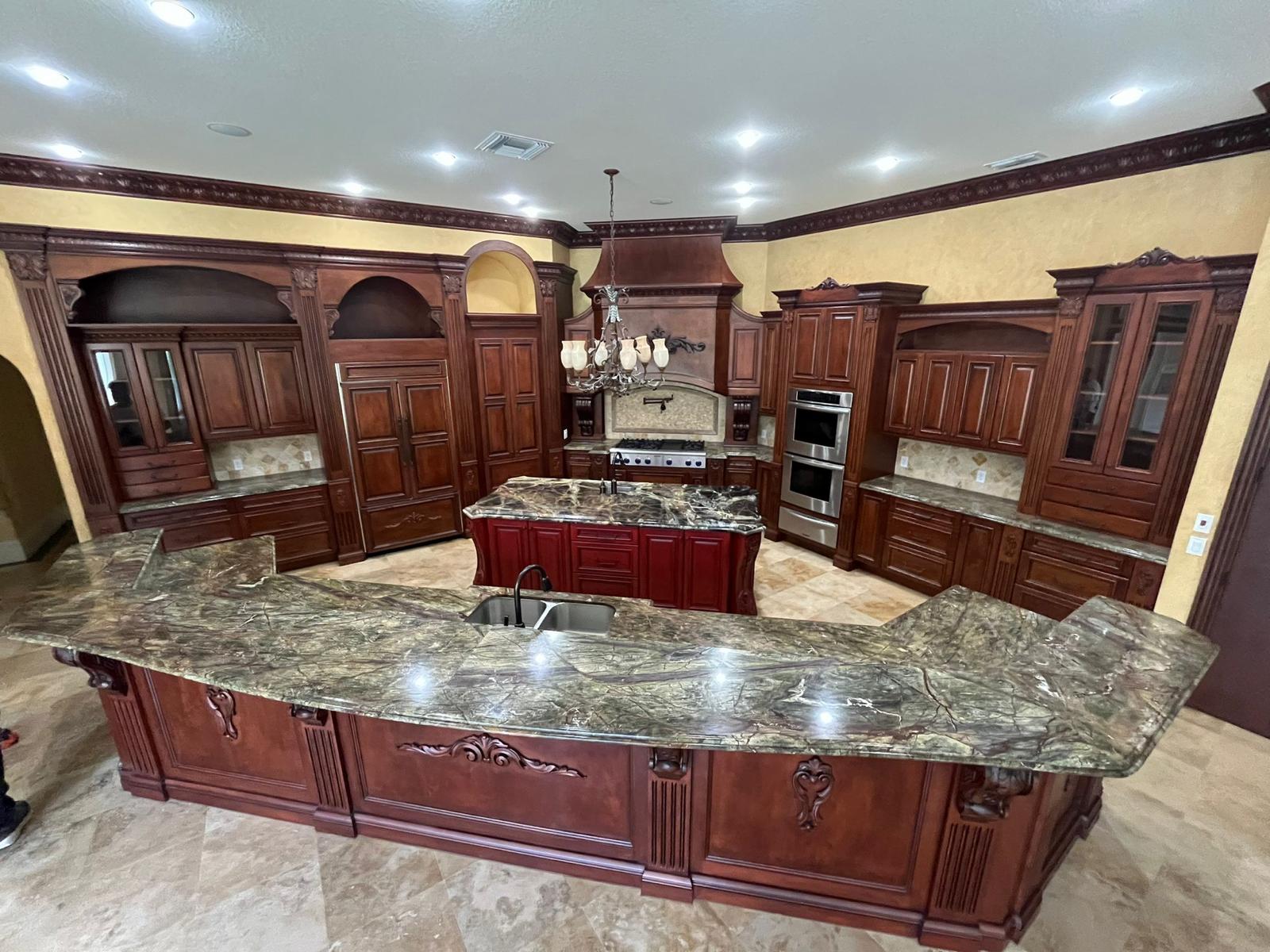 Worn kitchen cabinetry before painting