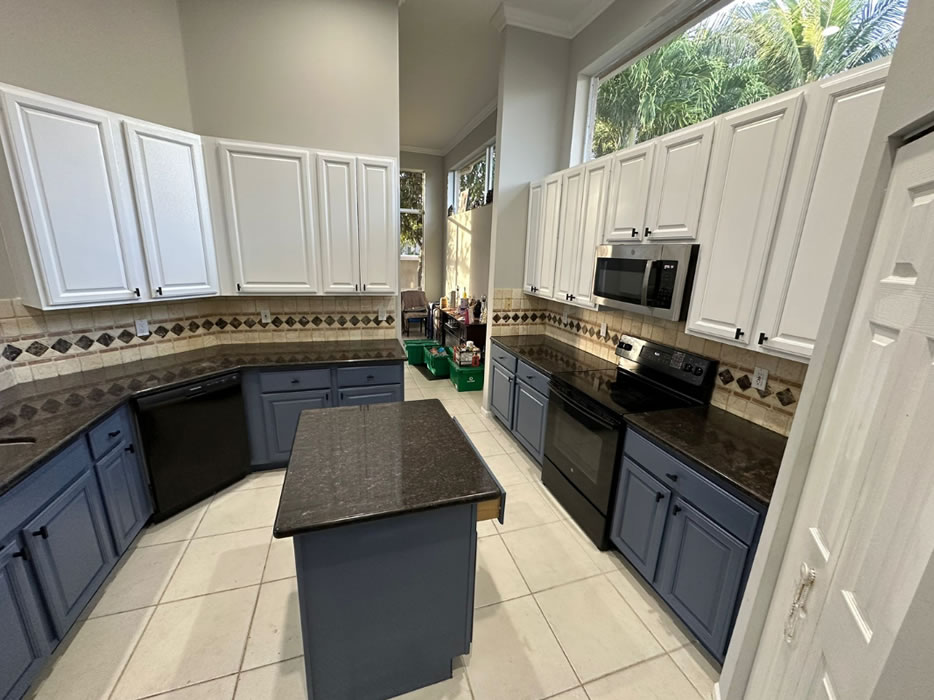 Refinished kitchen cabinetry with a smooth sprayed finish