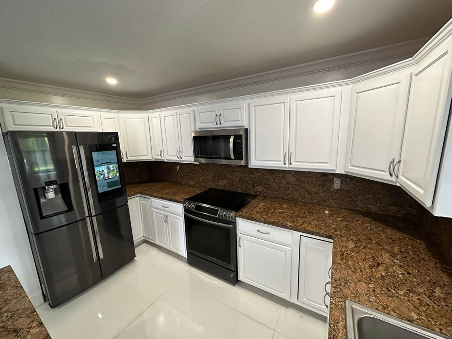 Kitchen after cabinet refinishing in South Florida